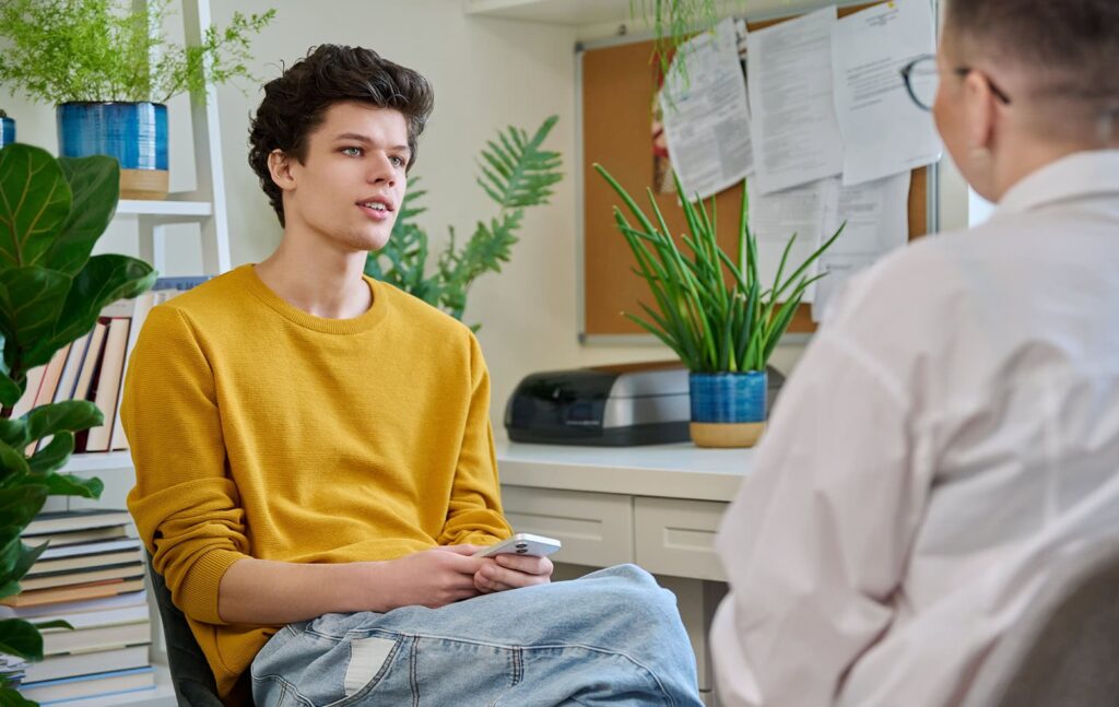 Student bei einem Meeting